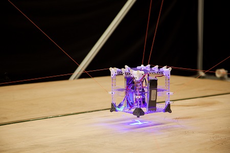   
		Figure 5: Portable cable-driven robot with a laser end-effector (robot named XL-Laser)	 
